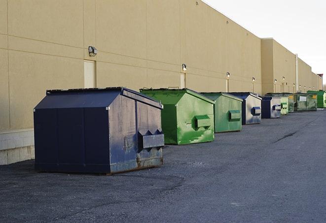 large garbage containers clustered on a construction lot in Green Valley, AZ